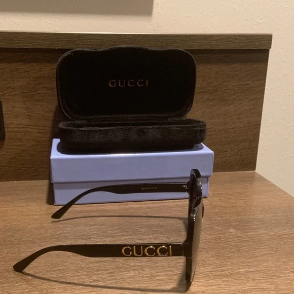 Gucci Black Sunglasses with Gold Accents - Picture 2 of 3